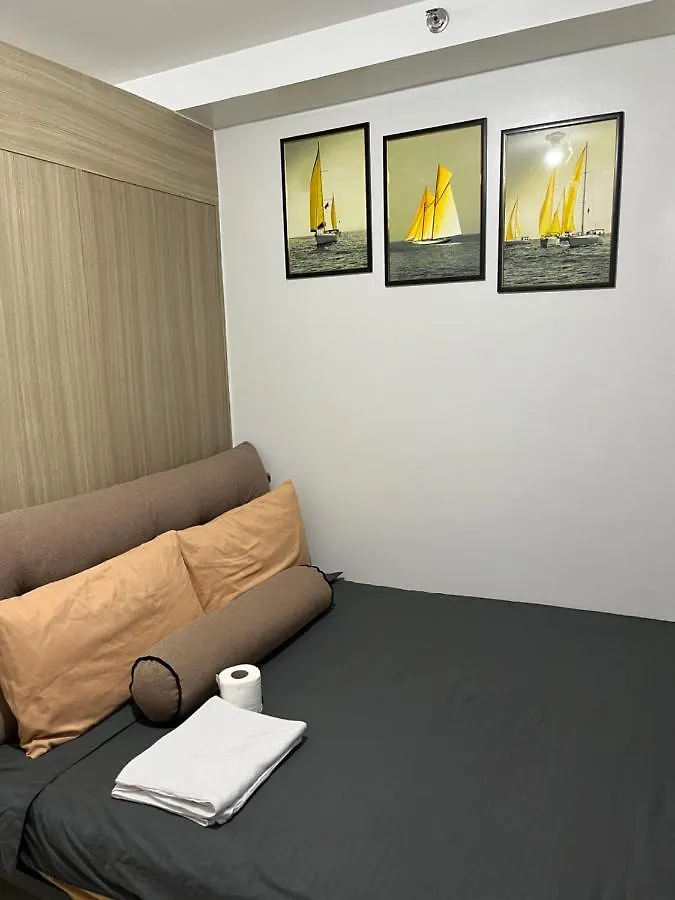Shore MOA: Cozy Family Apartment with Pool and Entertainment Access Manila