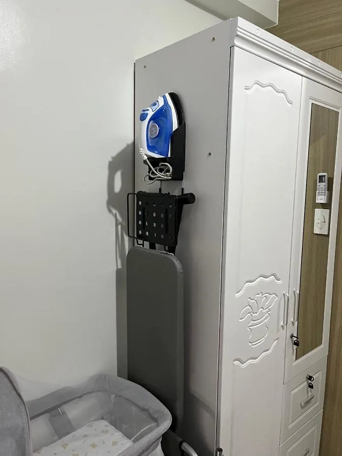 Shore MOA: Cozy Family Apartment with Pool and Entertainment Access Manila Philippines