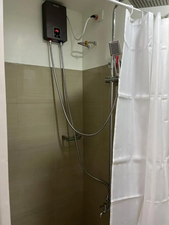 Shore MOA: Cozy Family Apartment with Pool and Entertainment Access Manila