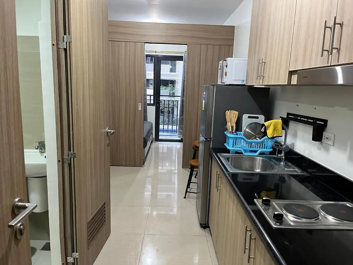 Shore MOA: Cozy Family Apartment with Pool and Entertainment Access Manila