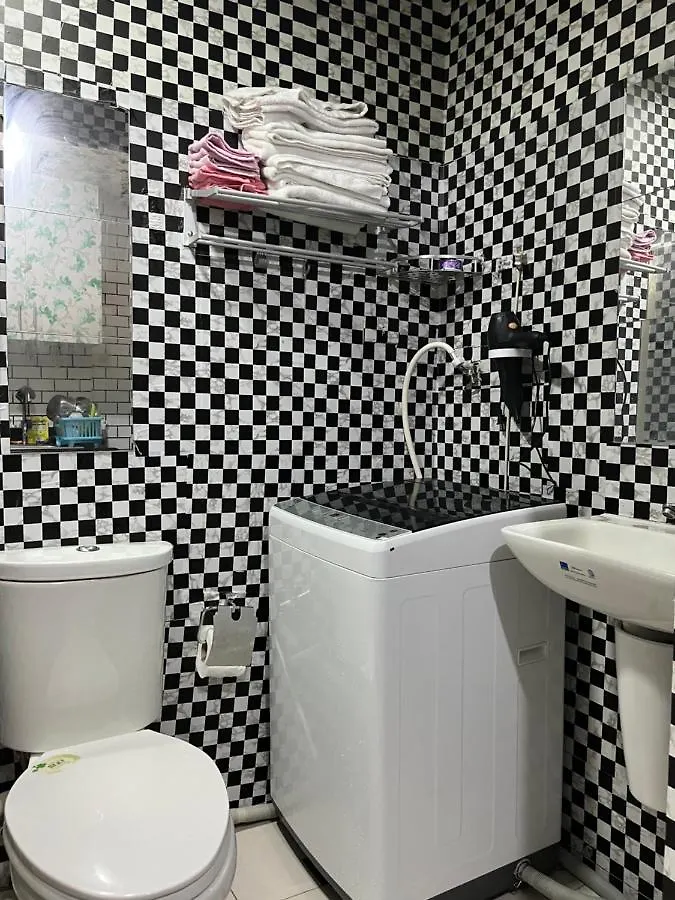 Shore MOA: Cozy Family Apartment with Pool and Entertainment Access Manila Philippines