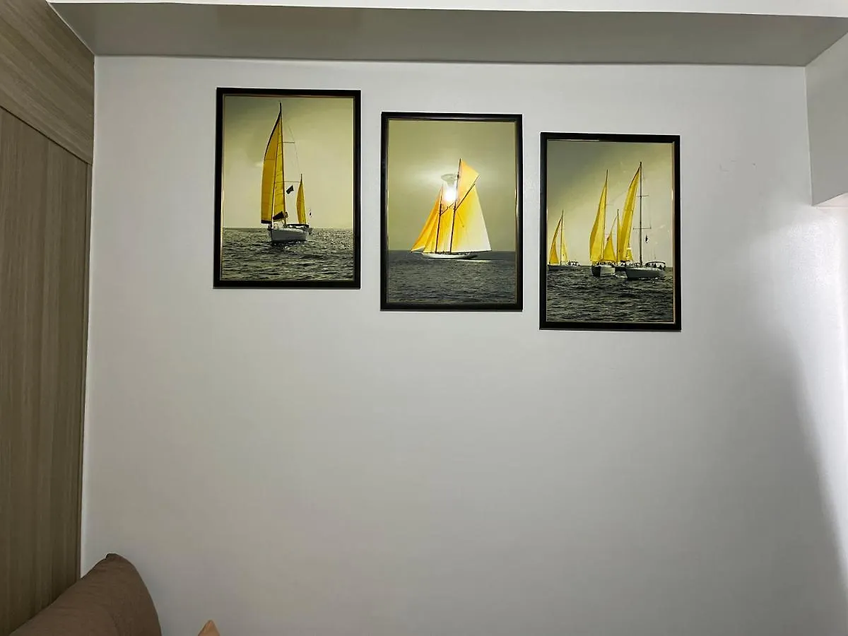 Shore MOA: Cozy Family Apartment with Pool and Entertainment Access Manila